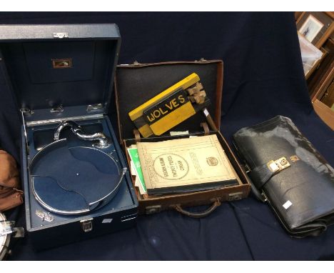 A collectors lot to include; a mid 20th Century HMV picnic record player with leather carry case, sheet music document carry 