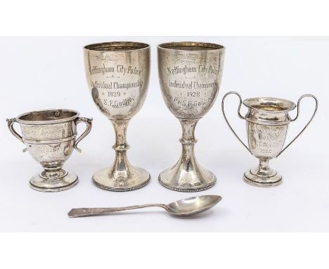 A collection of silver to include; a pair of silver goblet style trophies engraved "Nottingham City Police Individual Champio