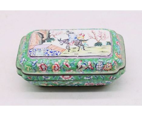 A small oriental metal casket with green enamel surround, and a design depicting figures riding a Donkey and nature around. Y