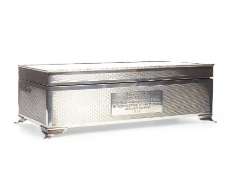 CONTEMPORARY SILVER CIGARETTE CASKET, maker Harham Brothers, Birmingham marks, of oblong form, the engine turned exterior wit