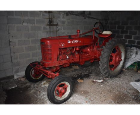A 1950 McCormick International Harvester Farmall Model H tractor, unregistered, chassis number FBH-293624X3, red. This tracto