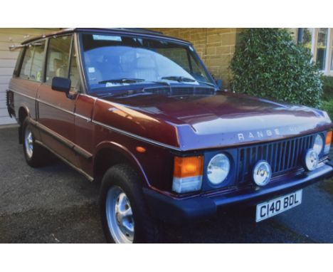 A 1986 left hand drive Range Rover Classic two door, registration number C140 BDL, Burgundy Calypso red, chassis number SALLH