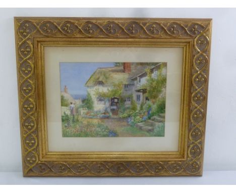 Arthur Wilkinson framed and glazed watercolour of an English country garden, signed bottom right, 27 x 38cm