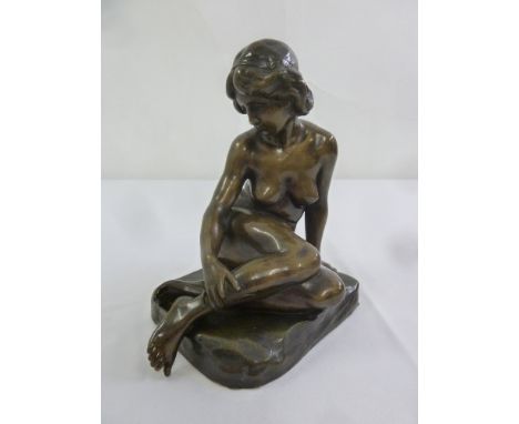 Fritz Kochendorfer a bronzed ceramic figurine of a nude seated lady