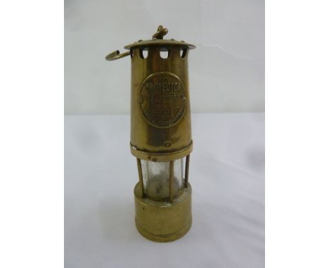 The Protector Lamp and Lighting Co. brass safety lamp with carrying handle
