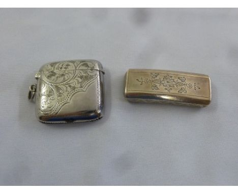 A George III silver snuff box rounded rectangular form with leaf and floral engraved sides and hinged cover, Birmingham 1811 