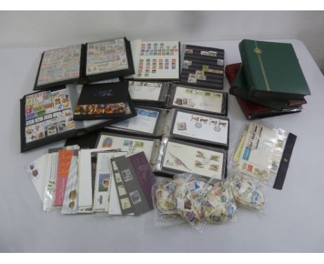 A quantity of GB and foreign stamps and first day covers, eleven albums and loose stamps
