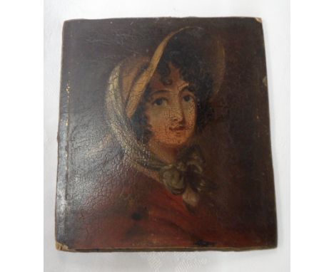 A small unframed 19th Century oil on board portrait of a woman wearing a bonnet