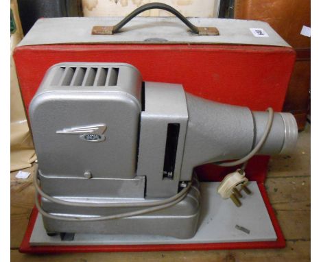 A vintage Gnome slide projector in case