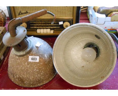 Two early 20th Century holophane lamps with textured glass shades contained within original metal casing and light fittings -