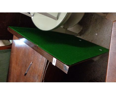 A vintage stained wood framed folding card table with green baize inset top