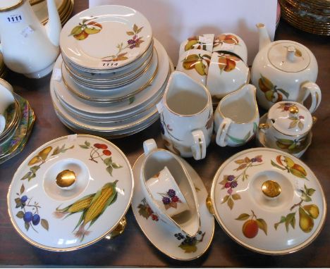 A large quantity of Royal Worcester Evesham tableware including teapot, jugs, tureens, cups and saucers, plates, etc.