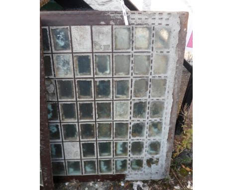 A large cast iron pavement light marked for Young &amp; Marten Ltd. London - minor damage to some prisms