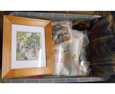 A crate containing a quantity of assorted textiles and related items including candlewick bedspread, large tapestry wall hang