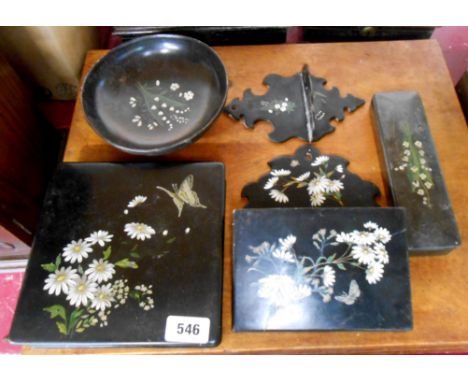 Five pieces of Victorian papier mache art comprising a square box, wall hanging letter rack, pen box, bowl and pipe rack