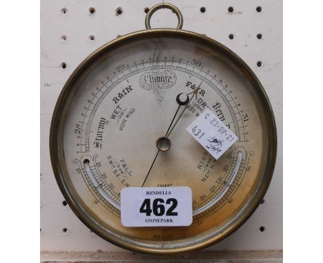 A small antique brass cased sedan style barometer with temperature scale and aneroid works - glass a/f