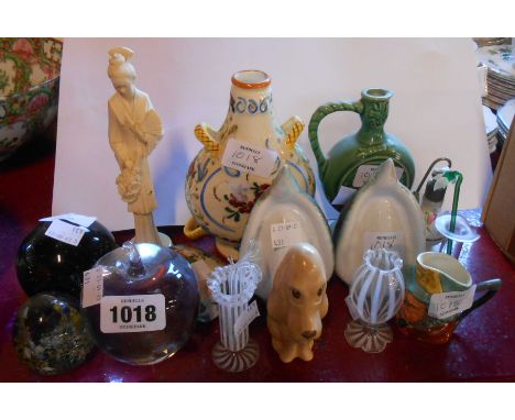 A selection of ceramic and glass items including Quimper frog, SylvaC dog, paperweights, etc.