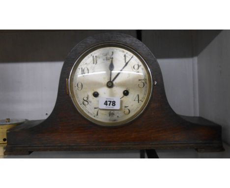 A vintage oak cased Napoleon hat mantle clock with eight day gong striking movement a/f