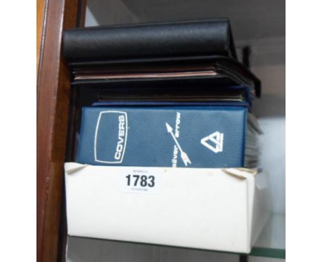 Three small ring bound albums containing mint decimal and pre decimal Guernsey stamps - sold with two ring bound albums conta