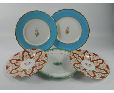 A pair of Royal Worcester crested plates, a Spode crested plate, the Worcester plates with blue and gilt banded borders and c