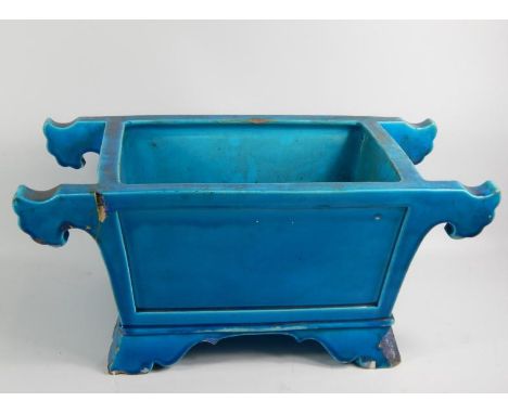 A Mintons turquoise glaze majolica planter, rectangular chinoisserie form, impressed marks, 54.4cm x 28.5cm x 24cm.