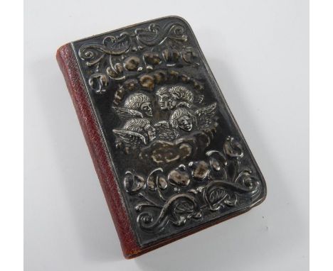 An Edwardian leather and silver mounted copy of Hymns Ancient and Modern, with Art Nouveau style silver mount decorated with 