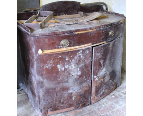 An early 19thC mahogany commode, with a three part galleried back, raised above a bowfront, with single drawer and double cup