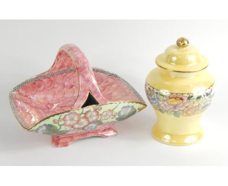 A Maling pottery basket decorated in the May Bloom pattern, against a pink scale ground, no 6482, and a Maling ginger jar and