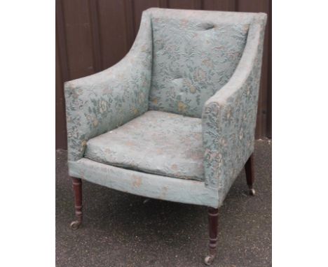 A late 19thC mahogany framed armchair, upholstered in turquoise floral material to the back, arms and seat with a removable c