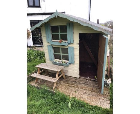 Children's' wooden outdoor playhouse with deck area and picnic bench (to be dismantled and collected by buyer)
