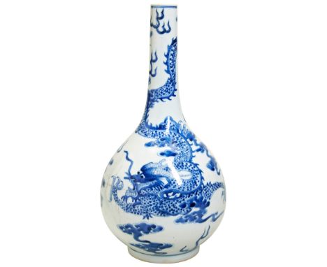 A 'BLUE DE HUE' 'DRAGON' BOTTLE VASE CHINESE FOR THE VIETNAMESE MARKET, 19TH CENTURY the baluster sides and slender neck pain