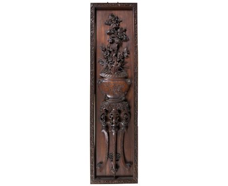 A FINE HUANGHUALI CARVED HANGING PANEL QING DYNASTY, 19TH CENTURY the rectangular panel elaborately carved in high relief wit