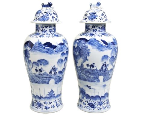PAIR OF BLUE AND WHITE VASES &amp; COVERS QING DYNASTY, 19TH CENTURY&nbsp; the baluster sides finely painted with figures in 