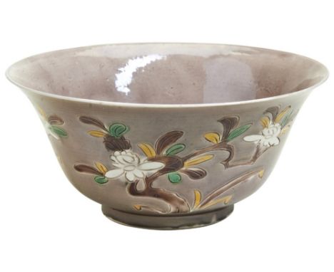 A CHINESE FAMILLE VERTE PORCELAIN DEEP BOWL WITH FLARED RIM EARLY KANGXI (1662-1722) carved on the exterior with three flower