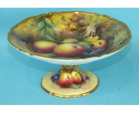A Royal Worcester porcelain comport decorated with fruit painted by Horace Price, date code for 1925, 24.5cm diameter.