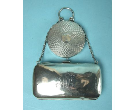 An Edwardian silver purse on chain, 9.5 x 5.5cm, Birmingham 1908 and an engine-turned compact, 5.5cm diameter, Birmingham 193