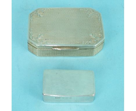 An engine-turned silver snuff box of rectangular form with canted corners, Birmingham 1929, 5.7 x 3.8 x 1.3cm, (inscription t