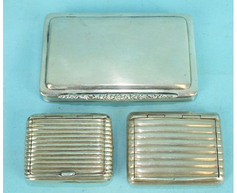 A Continental white metal snuff box of plain form, with chased thumb piece, 8.6 x 5.4 x 1.1cm, another with ribbed decoration