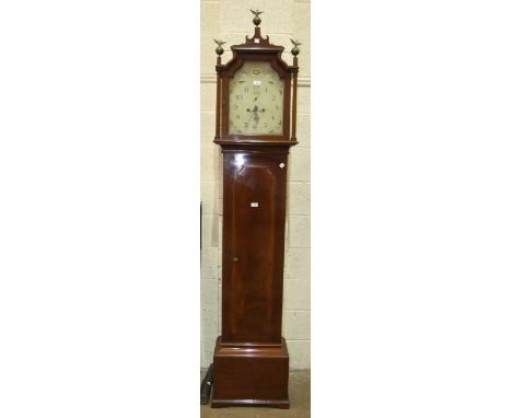 A 19th century mahogany long case clock with a shaped painted dial, second subsidiary and calendar aperture, 8-day bell-strik