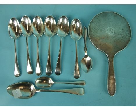 A set of six 20th century Old English tablespoons, London 1935, an engine-turned hand mirror and three other spoons, weighabl
