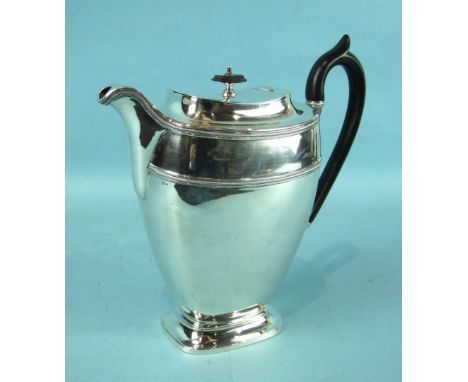 An early-20th century coffee pot of tapered oblong form, on spreading oblong foot, with linen filter and wood handle and fini