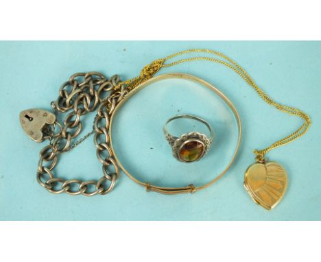 A modern 9ct gold (back and front) heart-shaped locket on chain, 6g, a gold-plated bangle and other items.