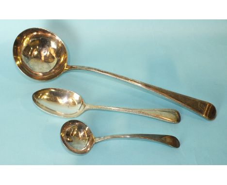 An Old English and beaded ladle, London 1783, an Old English sauce ladle, London 1786 and a Victorian beaded tablespoon, ___9