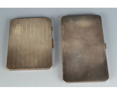 Two engine turned silver cigarette cases, 12.1oz.