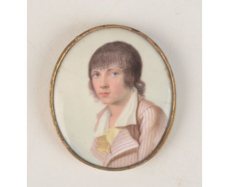 A rare late 18th century Battersea or south Staffordshire enamel miniature portrait of a young man wearing a striped frock co