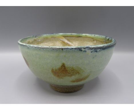 A Ray Finch Winchcombe Pottery bowl, the green ground with brown abstract decoration, height 7.5cm, diameter 12.5cm. 