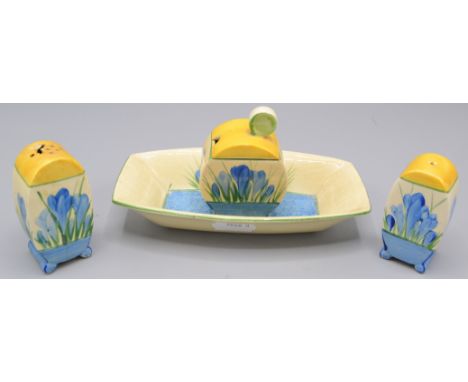 A Clarice Cliff crocus pattern 'Bizarre' cruet set, comprising salt, pepper and mustard pot and cover, length of tray 15cm. C