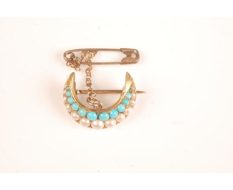 A gold pearl and turquoise set crescent brooch.