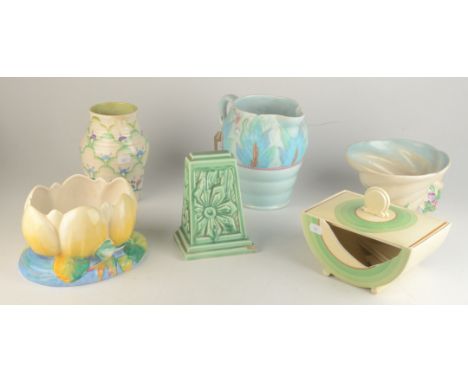 Miscellaneous Clarice Cliff, comprising two planters, a jug, a vase and three other items.