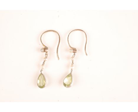 A pair of peridot and pearl earrings.